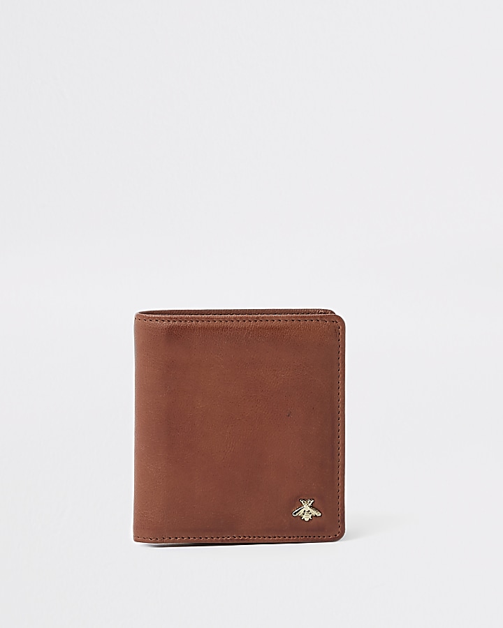 Tan wasp embellished fold out wallet