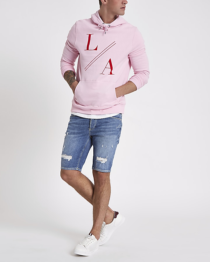 Pink ‘LA’ flock print slim fit hoodie