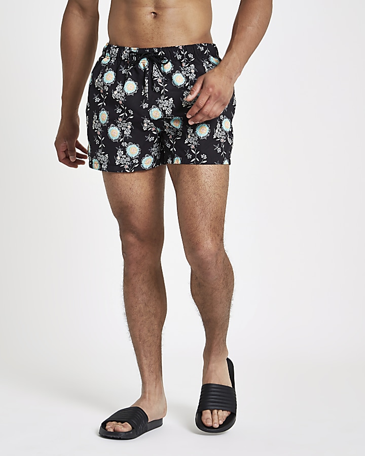 Black skinny fit floral swim shorts