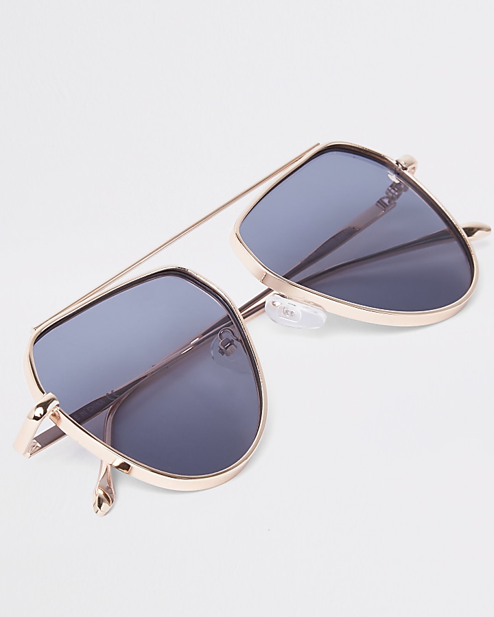 Gold tone aviator style sunglasses