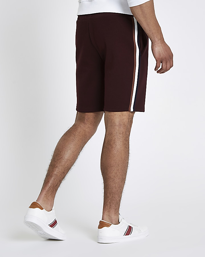Burgundy side tape slim fit shorts