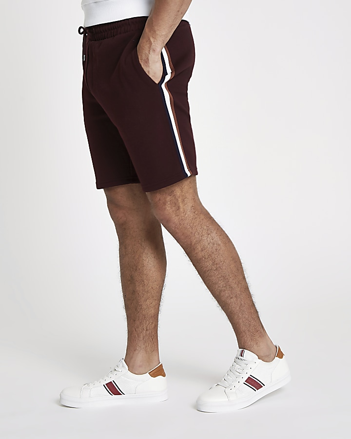 Burgundy side tape slim fit shorts