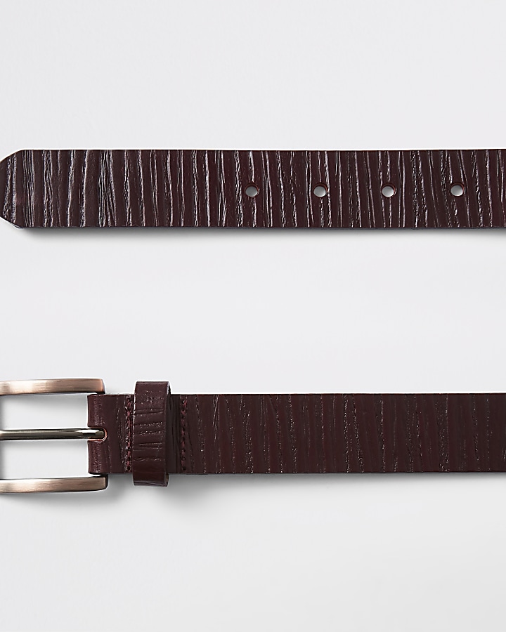 Dark red textured leather belt
