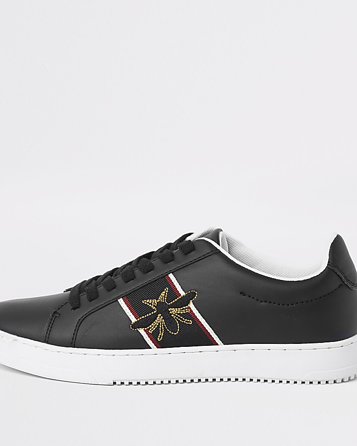 Black wasp embroidered trainers
