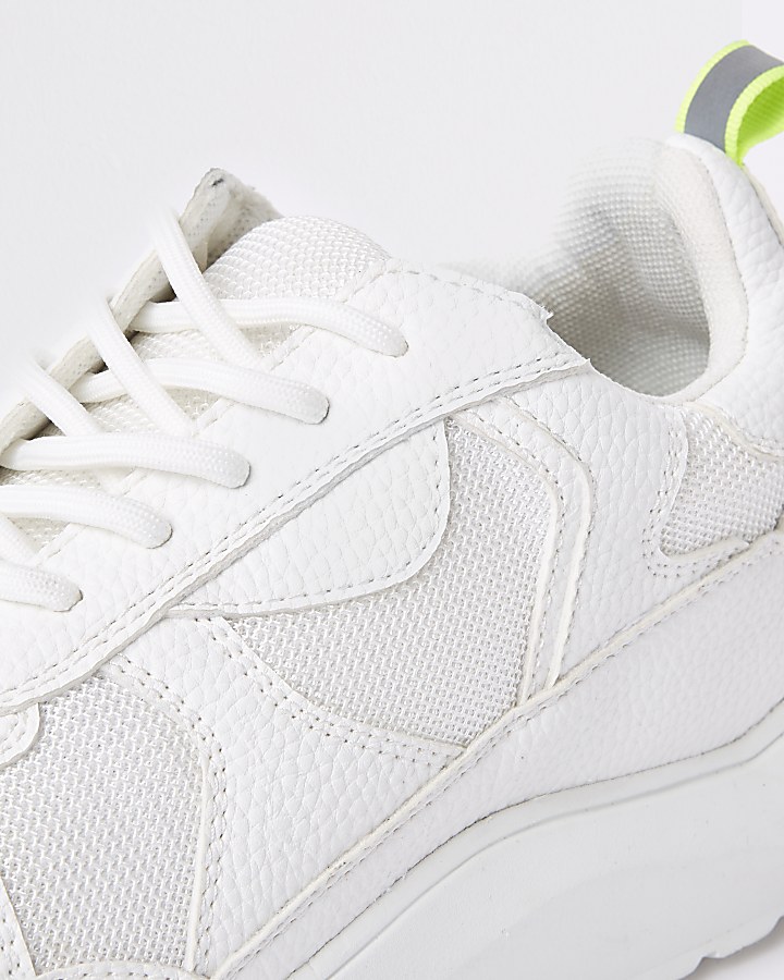 White chunky sole lace-up trainers