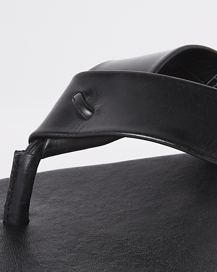 Black leather flip flop sandals