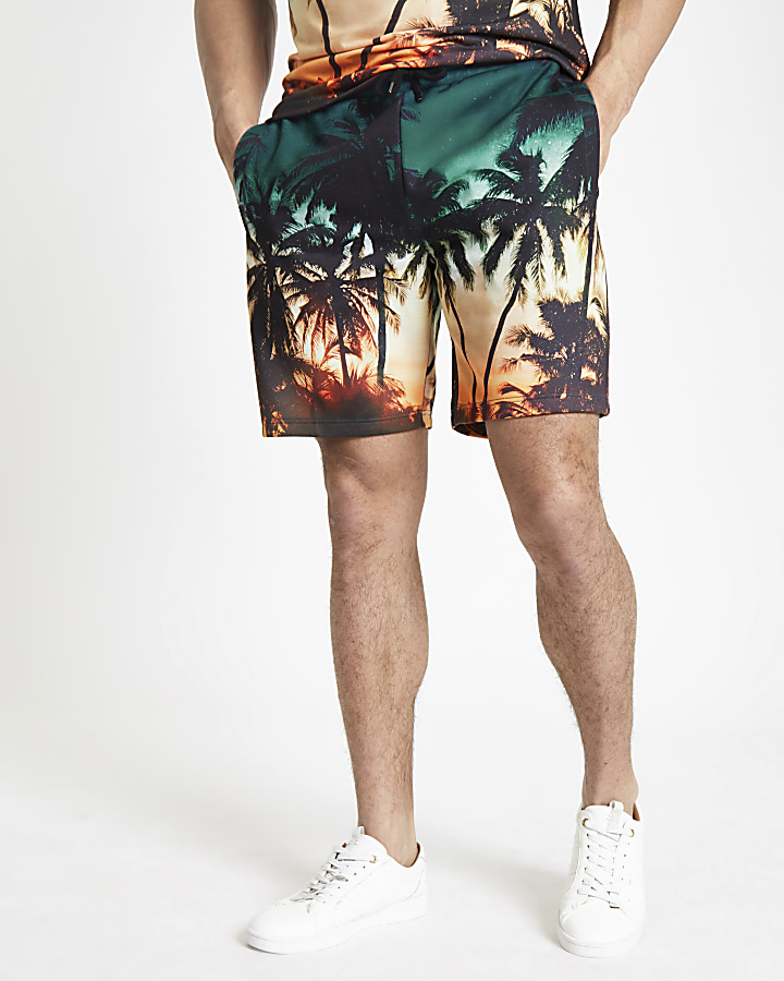 Blue palm print slim fit jersey shorts