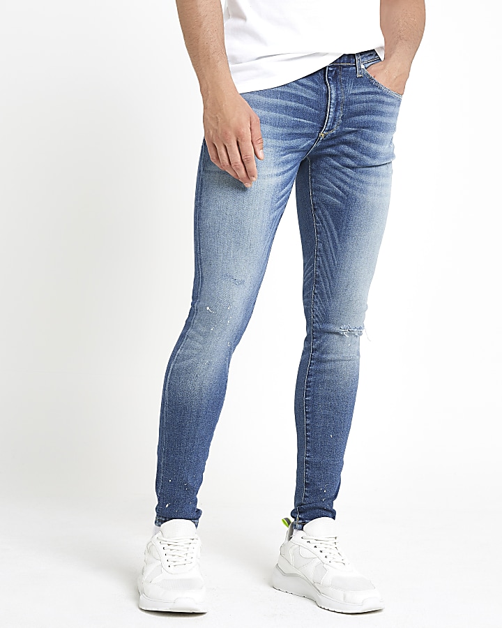 Mid blue Ollie skinny spray on ripped jeans