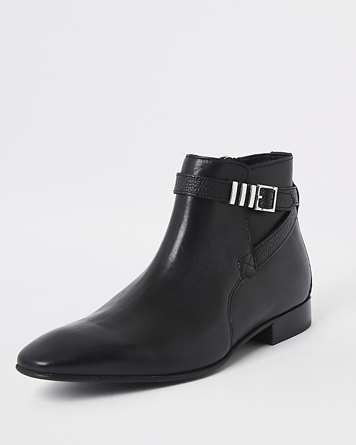 Black leather pointed toe buckle boot
