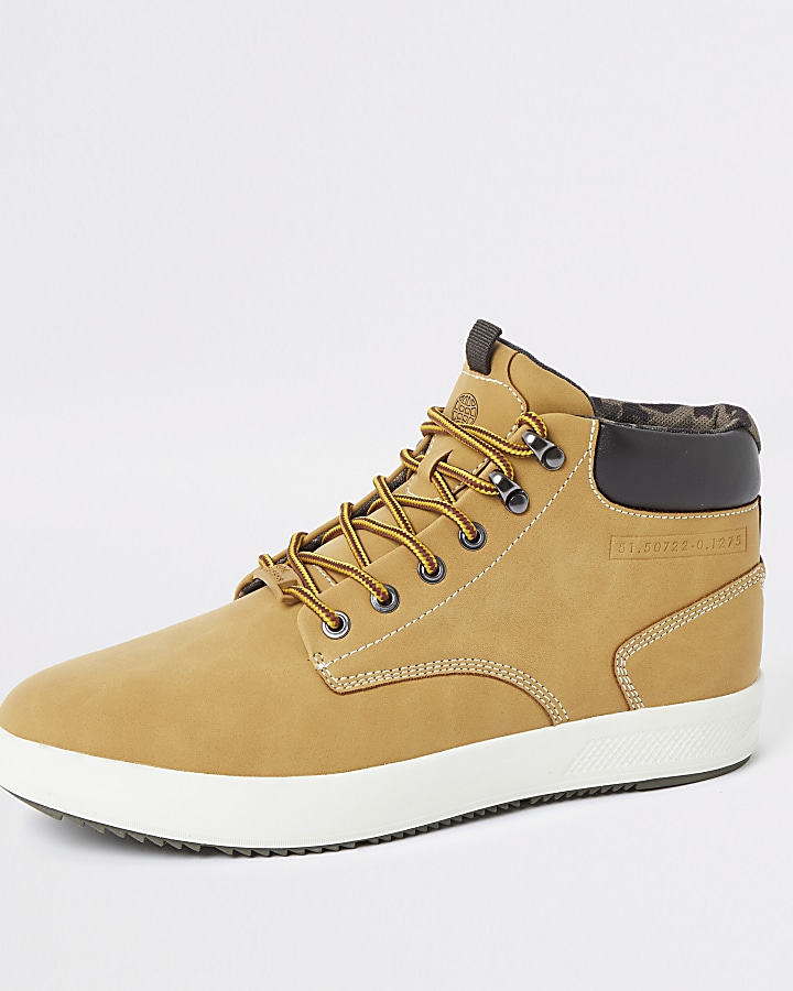 Light brown mid top trainers