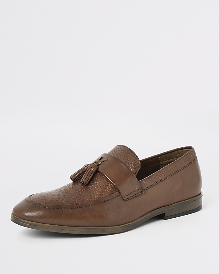 Brown leather tassel front textured loafers