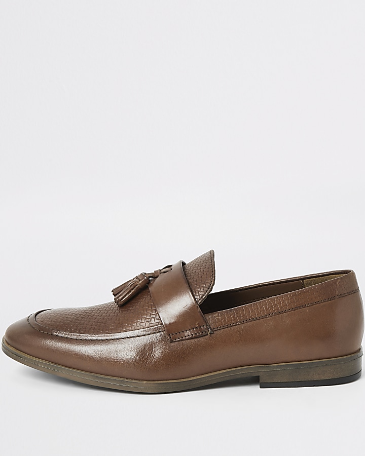 Brown leather tassel front textured loafers