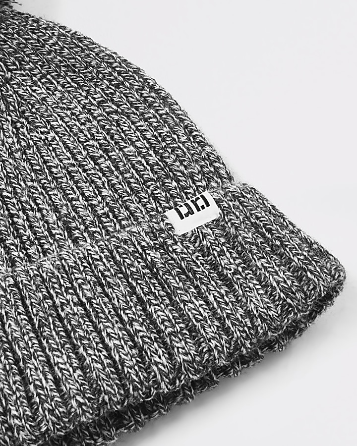 Grey twisted knit bobble hat