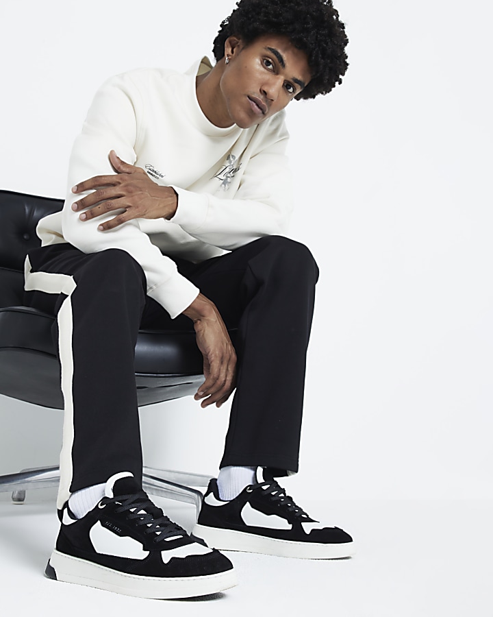 Black skater trainers store
