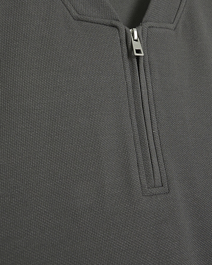 Grey slim fit textured half zip polo