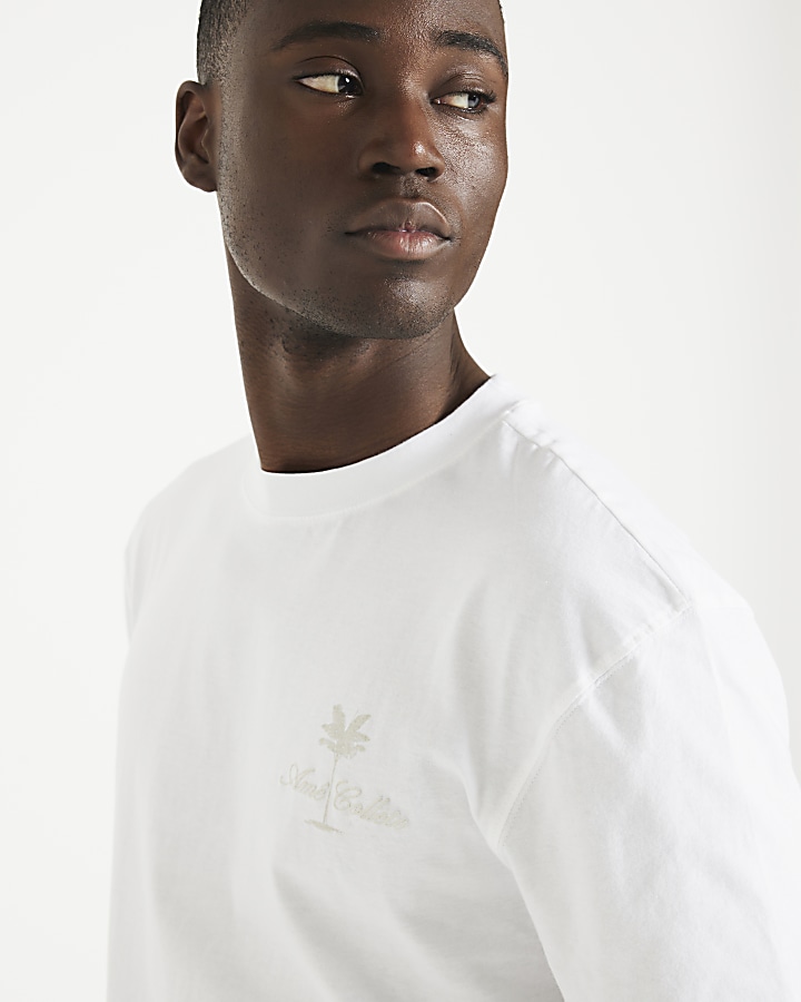 White regular fit embroidered t-shirt | River Island