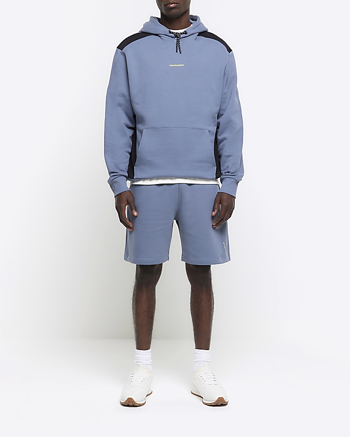 Blue regular fit colour block hoodie | River Island