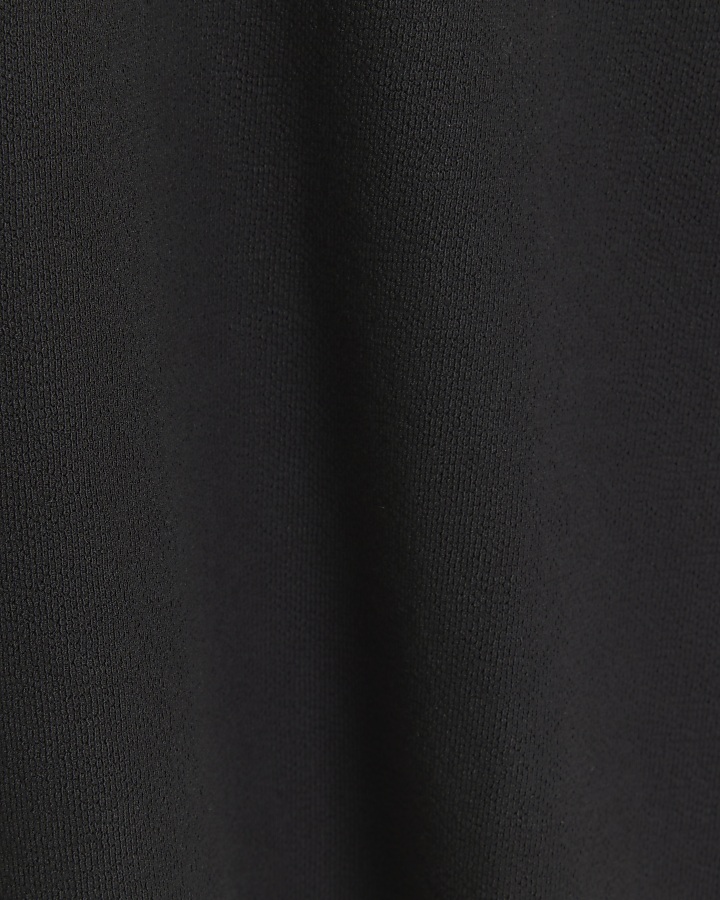 Black regular fit textured half zip polo