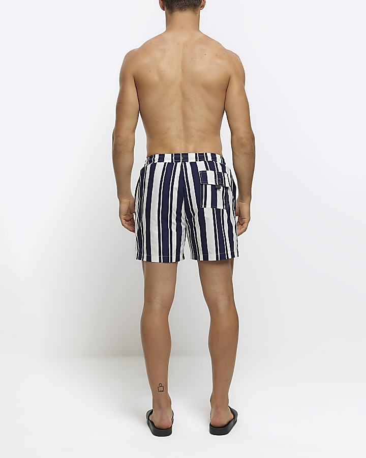 Navy regular fit stripe swim shorts River Island