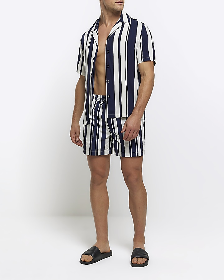 Navy regular fit stripe swim shorts River Island
