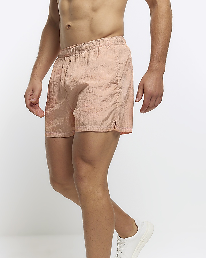 Pink elasticated swim shorts