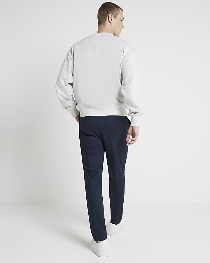 Navy slim fit smart chino trousers | River Island