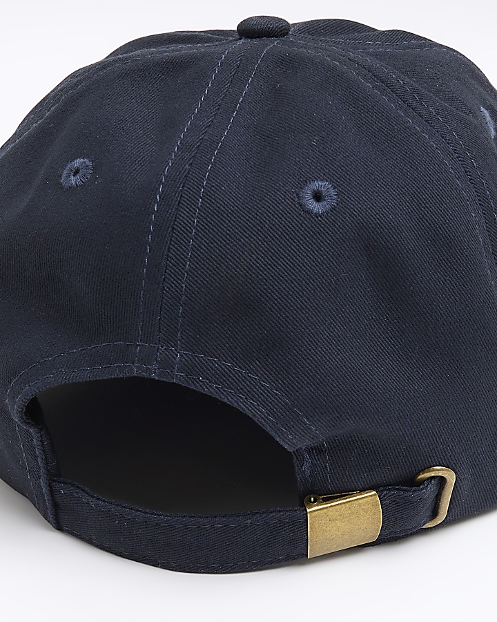 Navy flat peak cap River Island