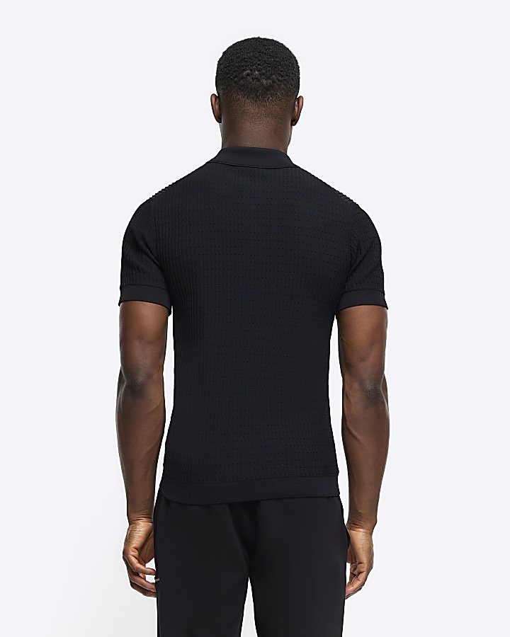 Black muscle fit knitted half zip polo