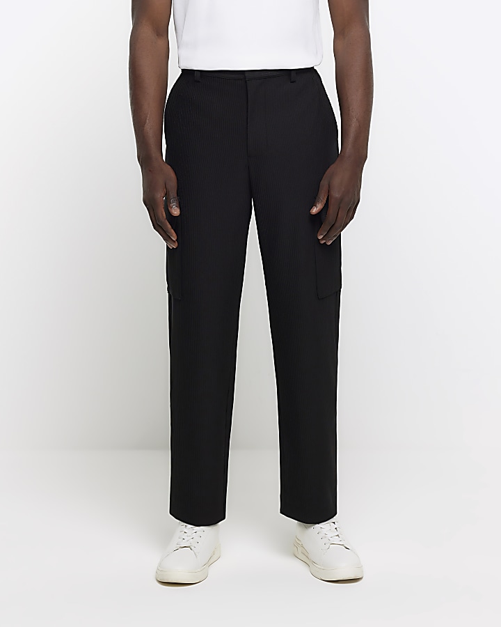 Black tapered fit plisse cargo trousers | River Island