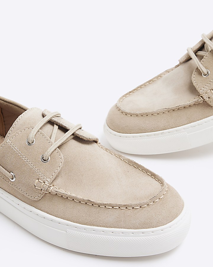 Beige suede boat shoes