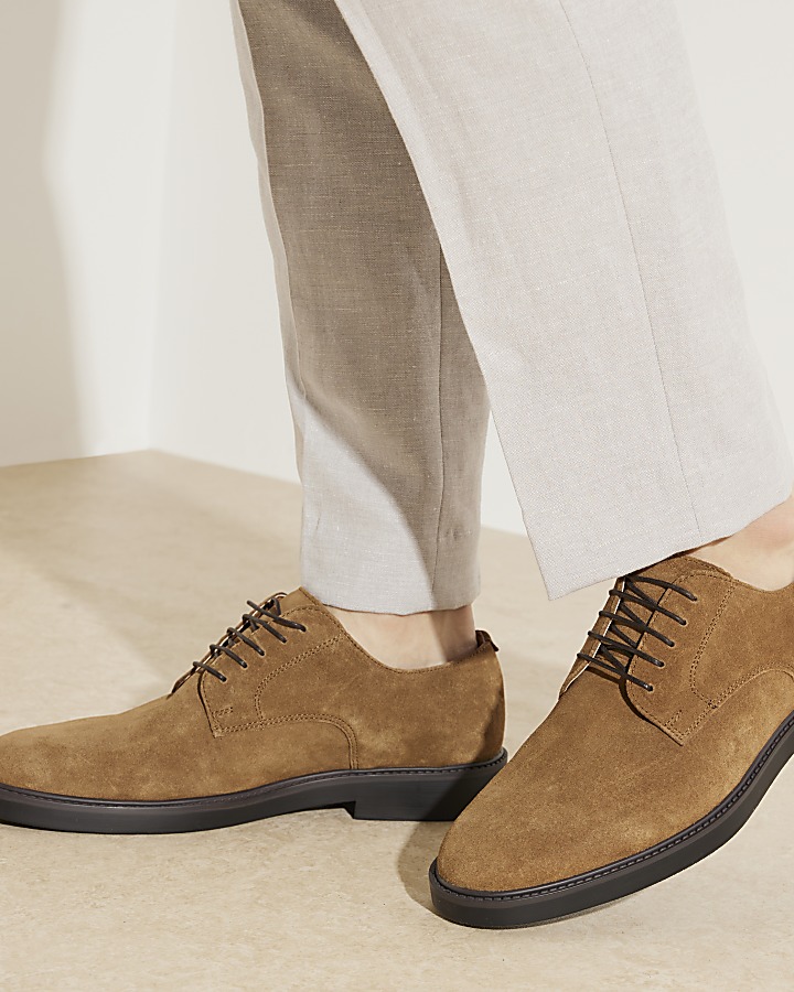 Brown suede derby shoes