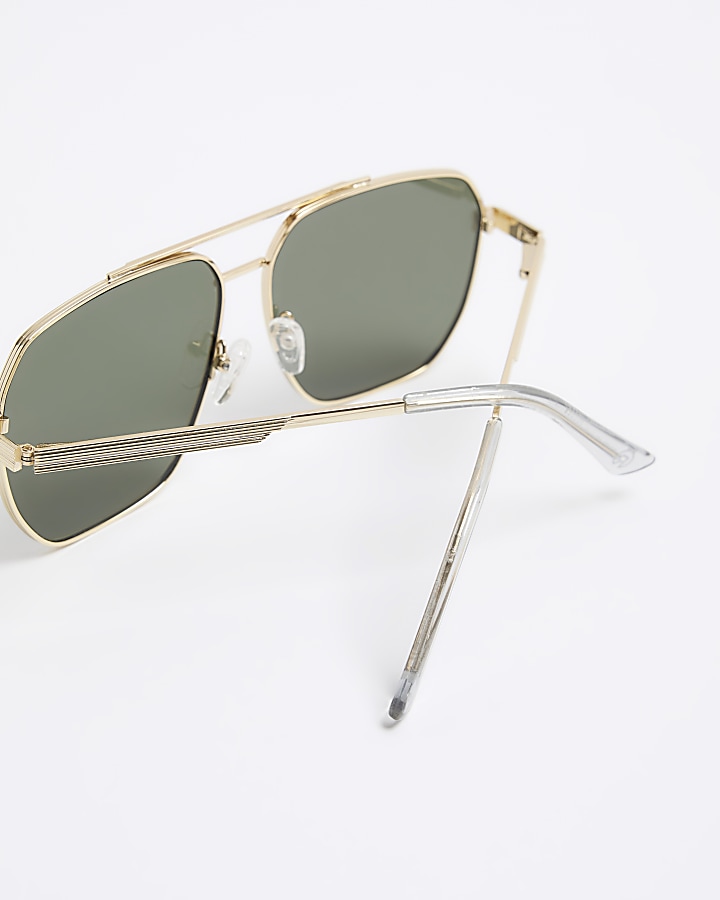 Gold rim navigator sunglasses