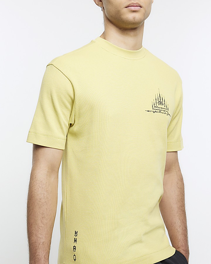 Yellow regular fit textured graphic t-shirt