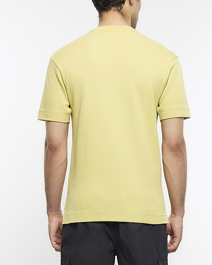 Yellow regular fit textured graphic t-shirt