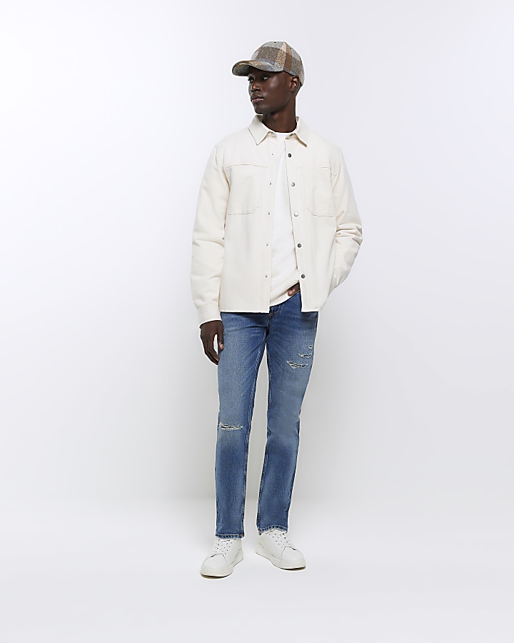 Blue Slim Fit Ripped Jeans | River Island