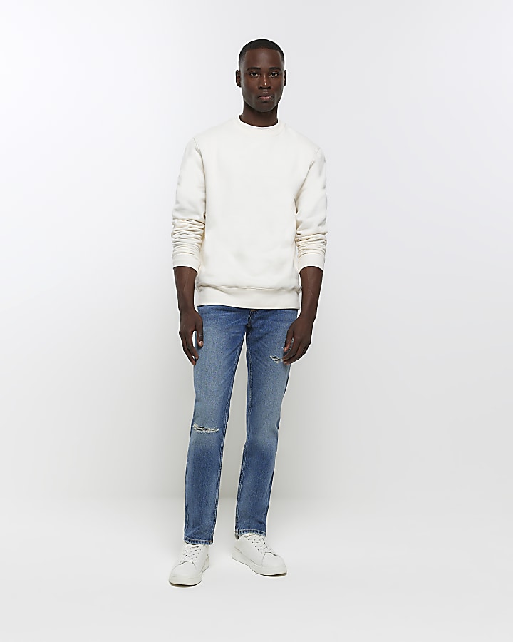 Blue Slim Fit Ripped Jeans | River Island