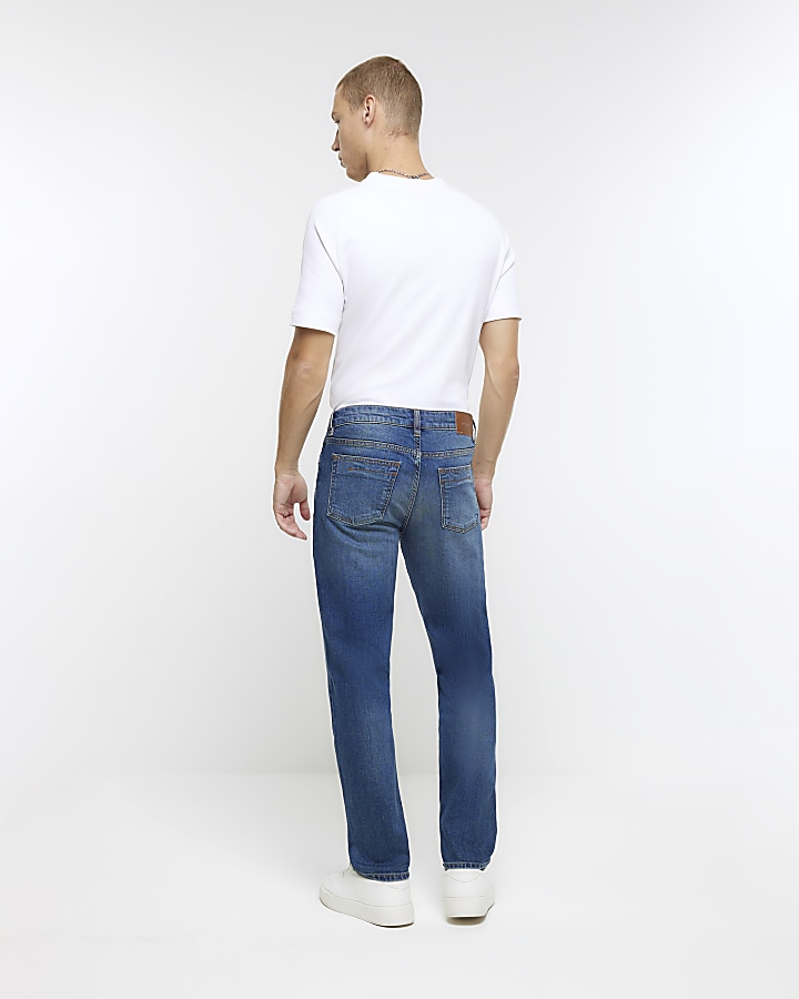 Dark blue slim fit faded jeans | River Island