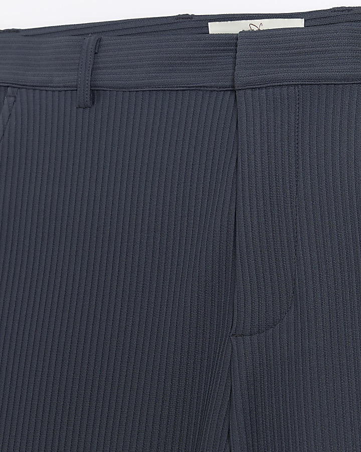 Blue tapered fit plisse smart trousers