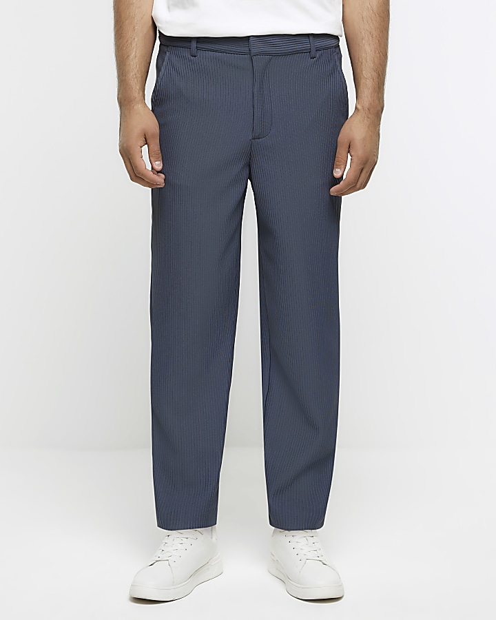 Blue tapered fit plisse smart trousers | River Island