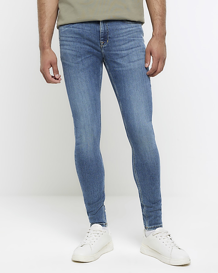 Blue super skinny spray on washed jeans | River Island