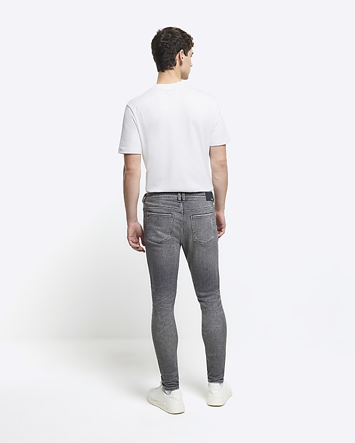 Grey super skinny spray on faded jeans