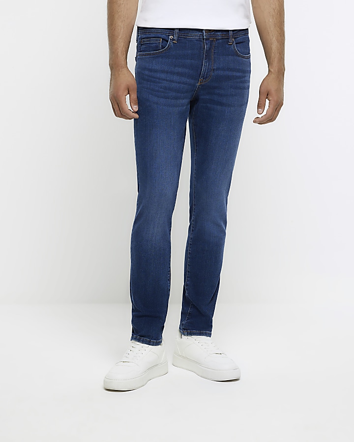 Washed dark blue skinny fit jeans | River Island