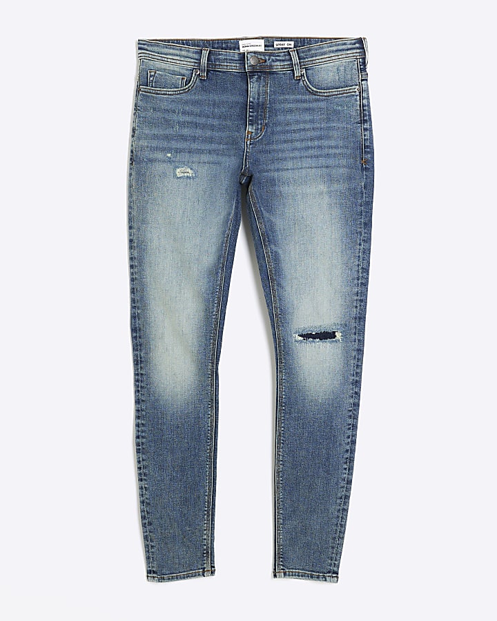 Blue spray on super skinny ripped jeans