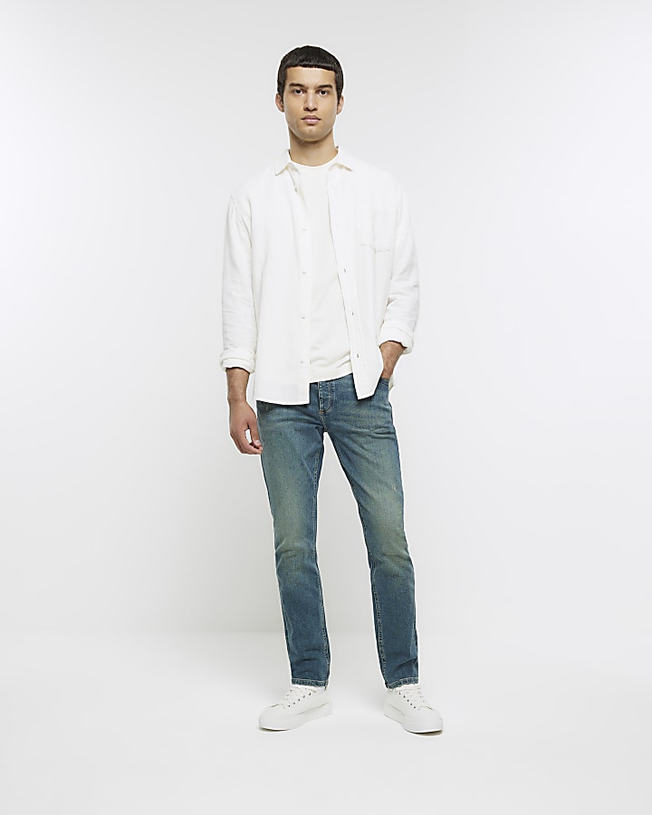 Blue slim fit faded jeans | River Island