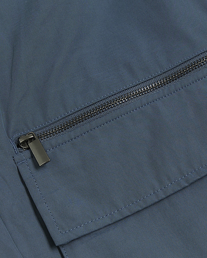 Blue slim fit multi pocket cargo trousers | River Island