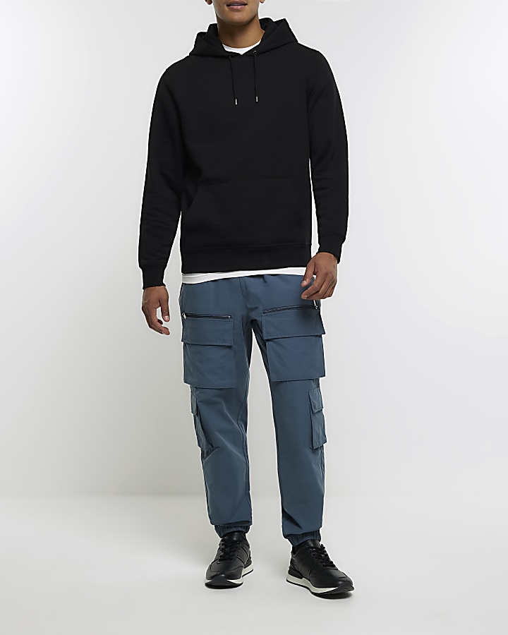 Blue slim fit multi pocket cargo trousers | River Island