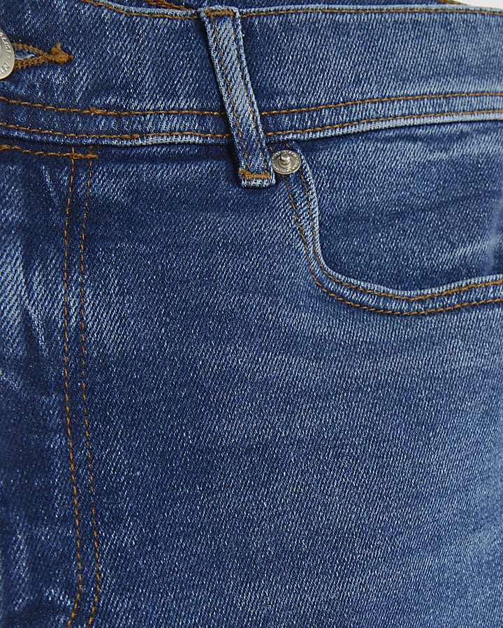 Washed dark blue skinny fit jeans | River Island