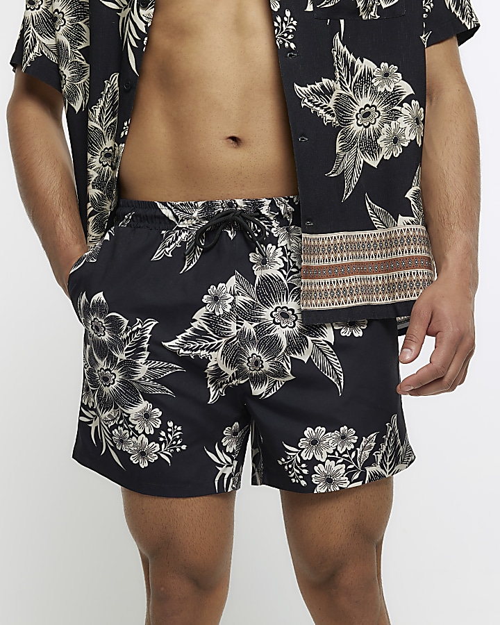 Black regular fit floral swim shorts River Island