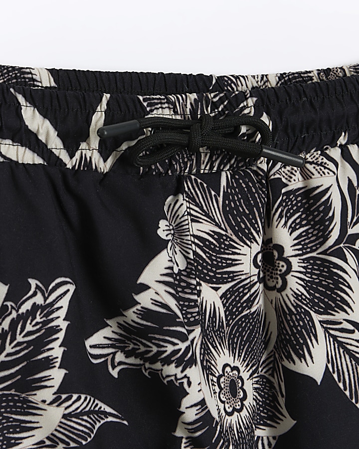 Black regular fit floral swim shorts River Island