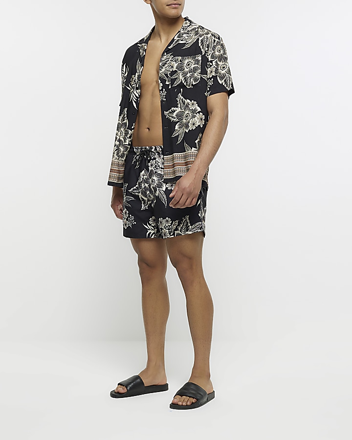 Black regular fit floral swim shorts River Island